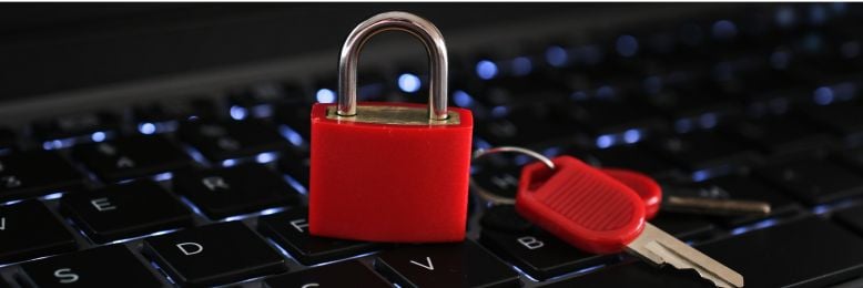 Red padlock on a keyboard symbolizing DMARC protocol for email security