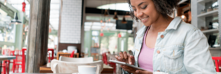 A customer enjoying a coffee shops wifi