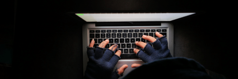 A hacker on a laptop