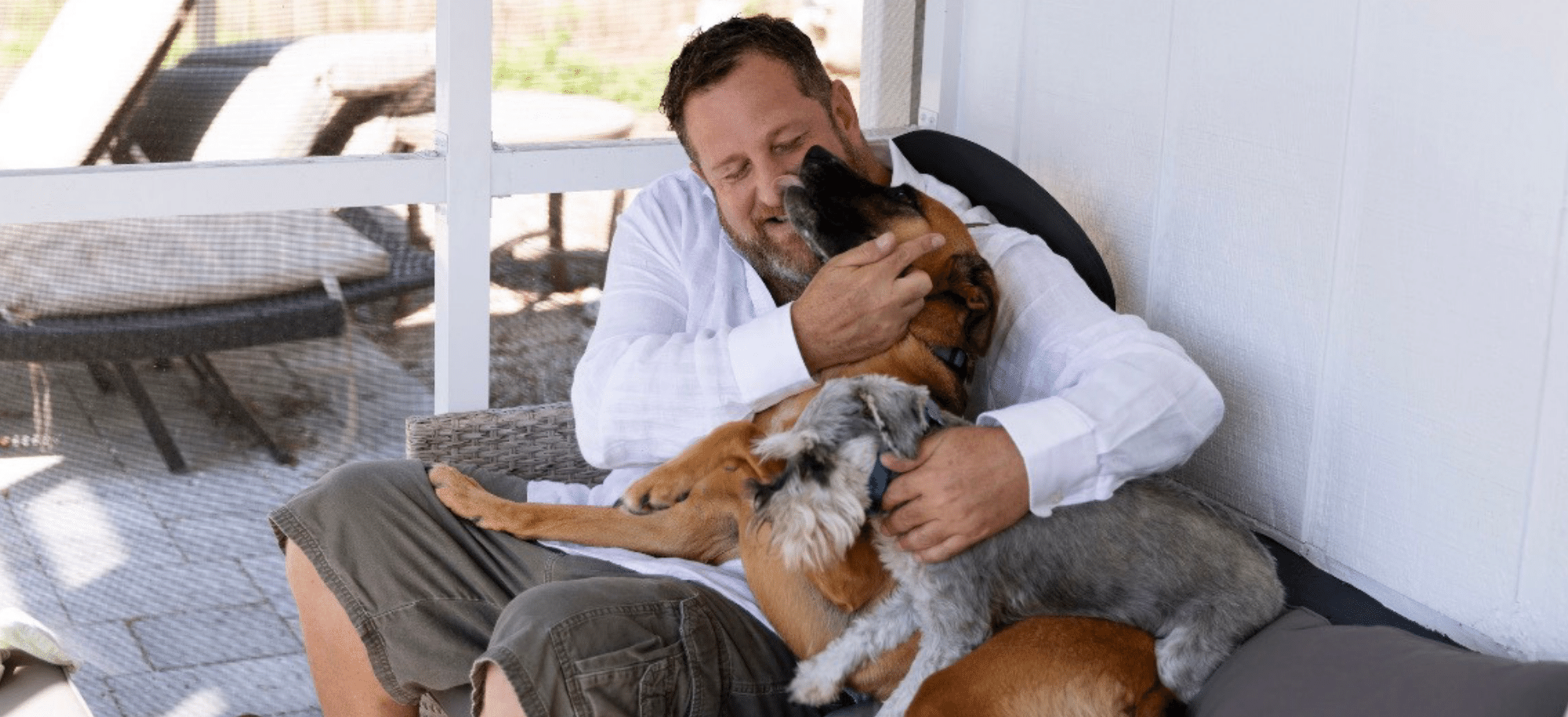 Brain Kaminsky with his rescue dogs