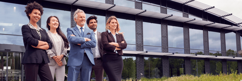 Business team standing together after a managed IT provider strategy meeting