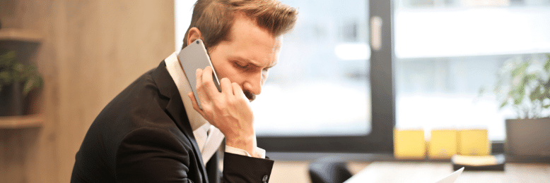 Businessman making phone calls using mobile phone