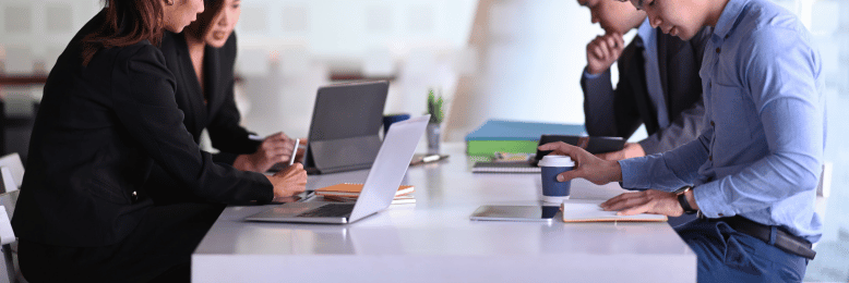 Businesspeople planning a conference room design.