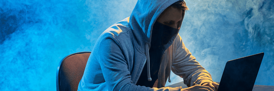 Cybercriminal hacking a business network