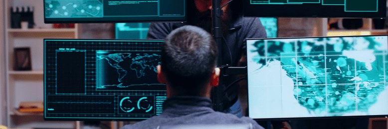 Cybersecurity professionals monitoring network activity for SOC 1 and SOC 2 compliance audits