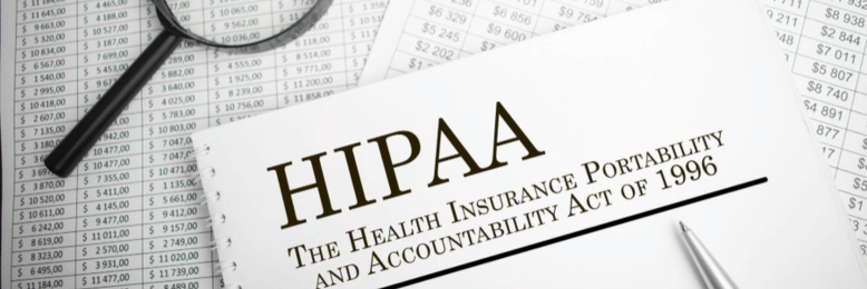 HIPAA booklet with magnifying glass