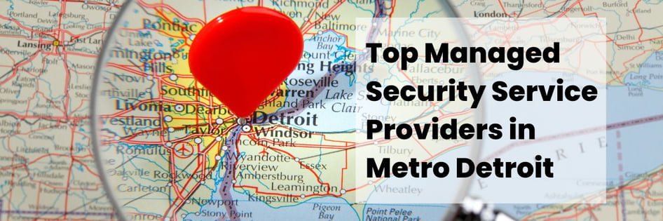 A map with a pin on Detroit and a magnifying glass 