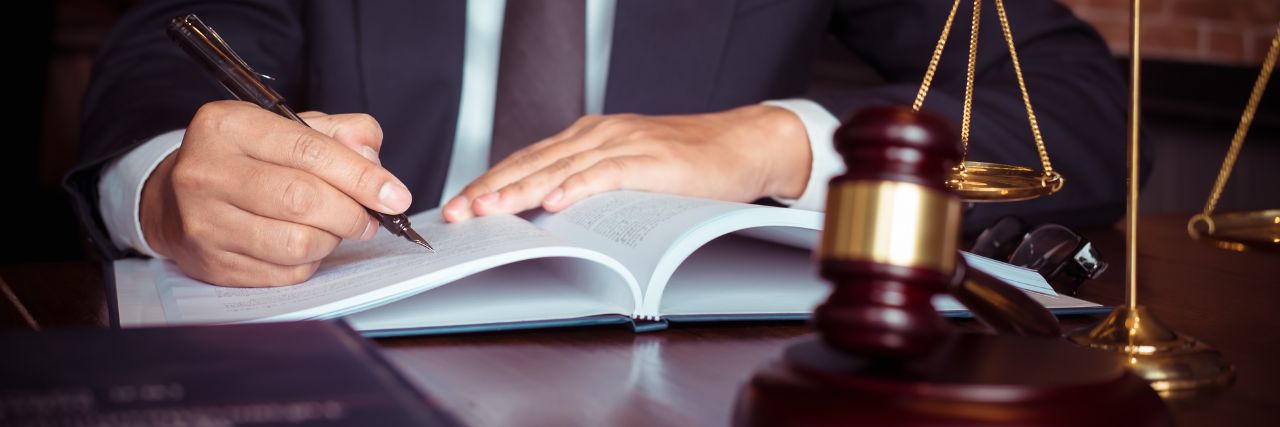 a lawyer reading a contract