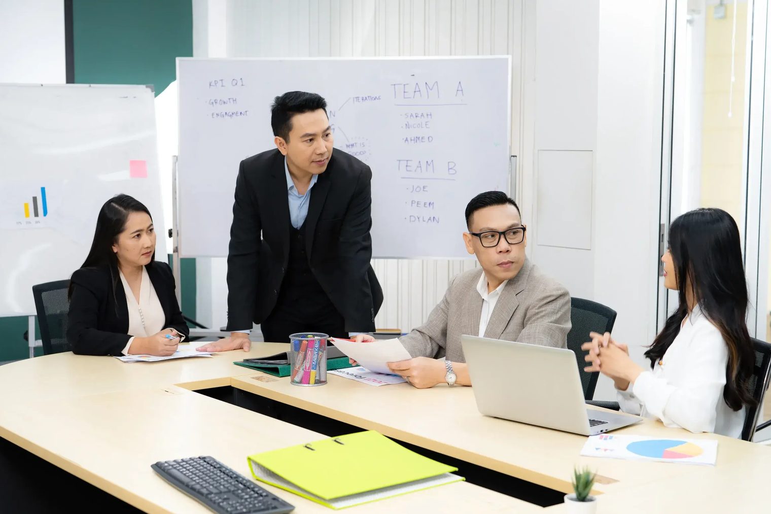 A leadership team around a boardroom table reviewing a report, standing in for the executive briefing the Crawl discovery produces