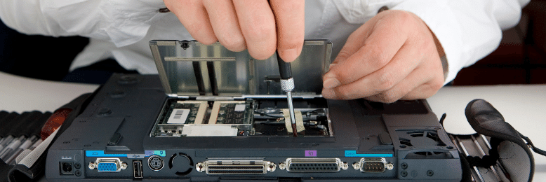 IT Technician repairing laptop