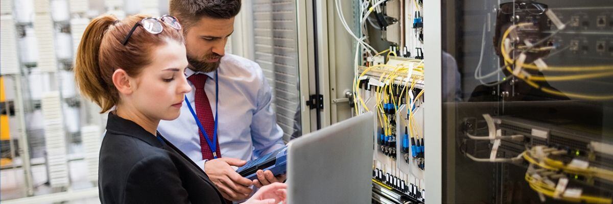 IT Technicians inspecting new servers