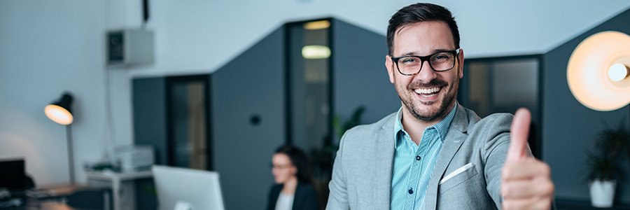 a person doing the thumbs up because his business was prepared for the new normal