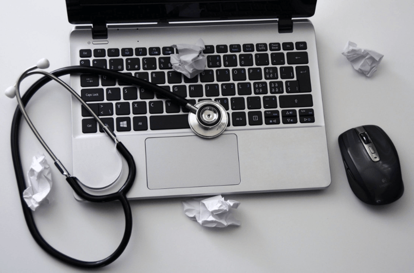 A laptop being diagnosed for disaster recovery 