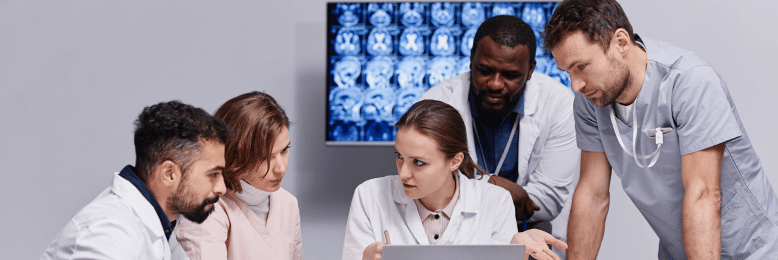 Medical team collaborating, indicative of healthcare MSP multidisciplinary approach