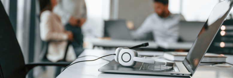 Office setting with laptop and VoIP headset