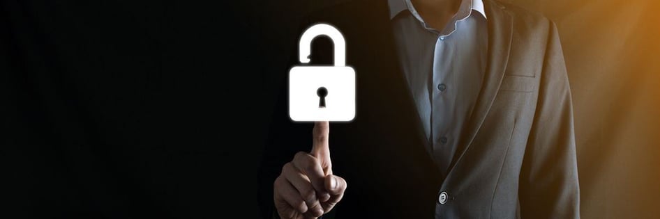 A finger pressing a padlock button representing a password manager