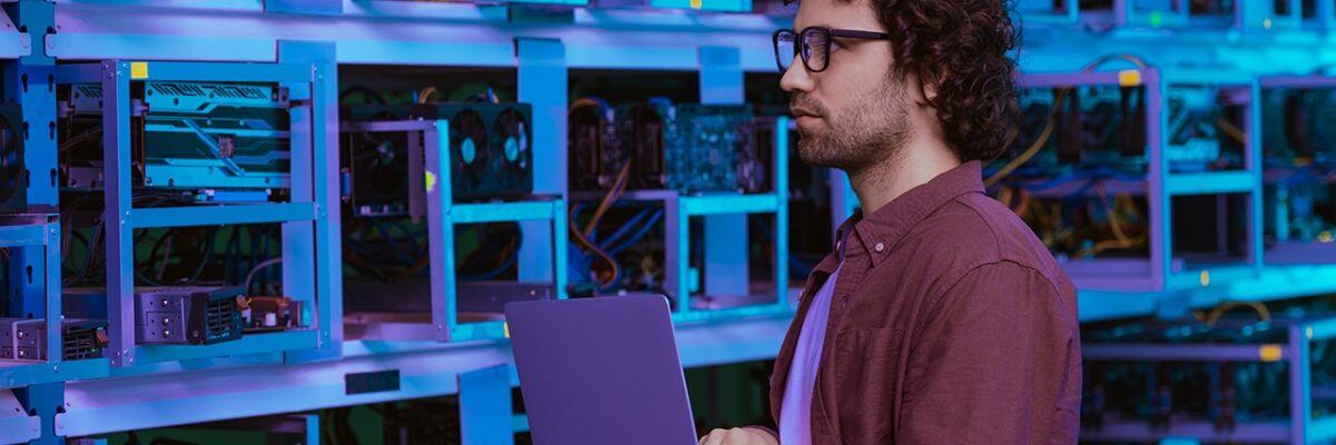 IT Technician overlooking servers and hardware