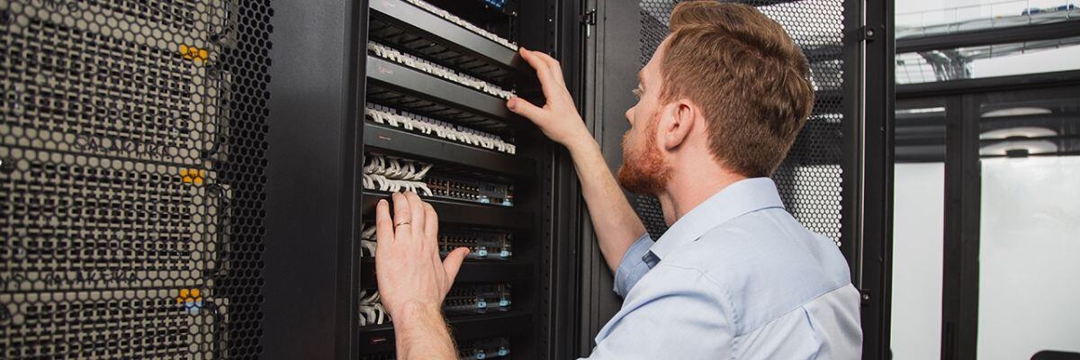 IT technician checking servers