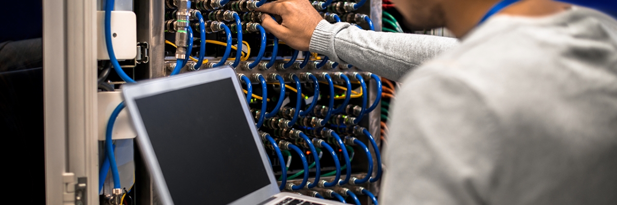 An IT Technician checking servers