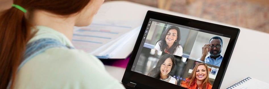 A laptop screen with a video conference ongoing using Microsoft Teams