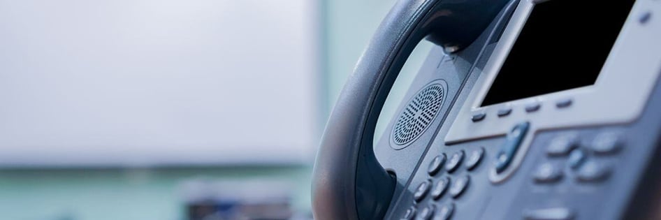 VoIP phone on a desk