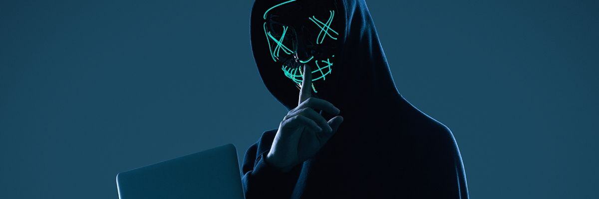 A hacker wearing a mask