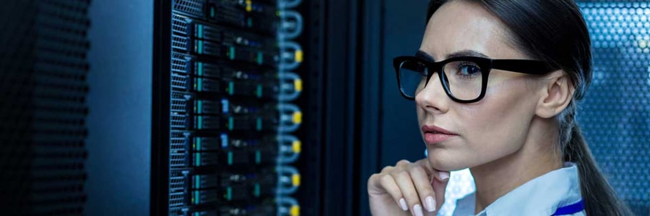 An IT technician checking the servers