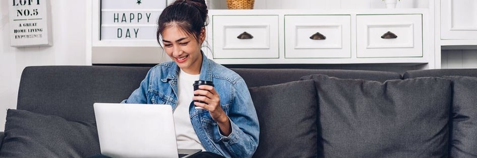 An employee happy working at home with a safe network