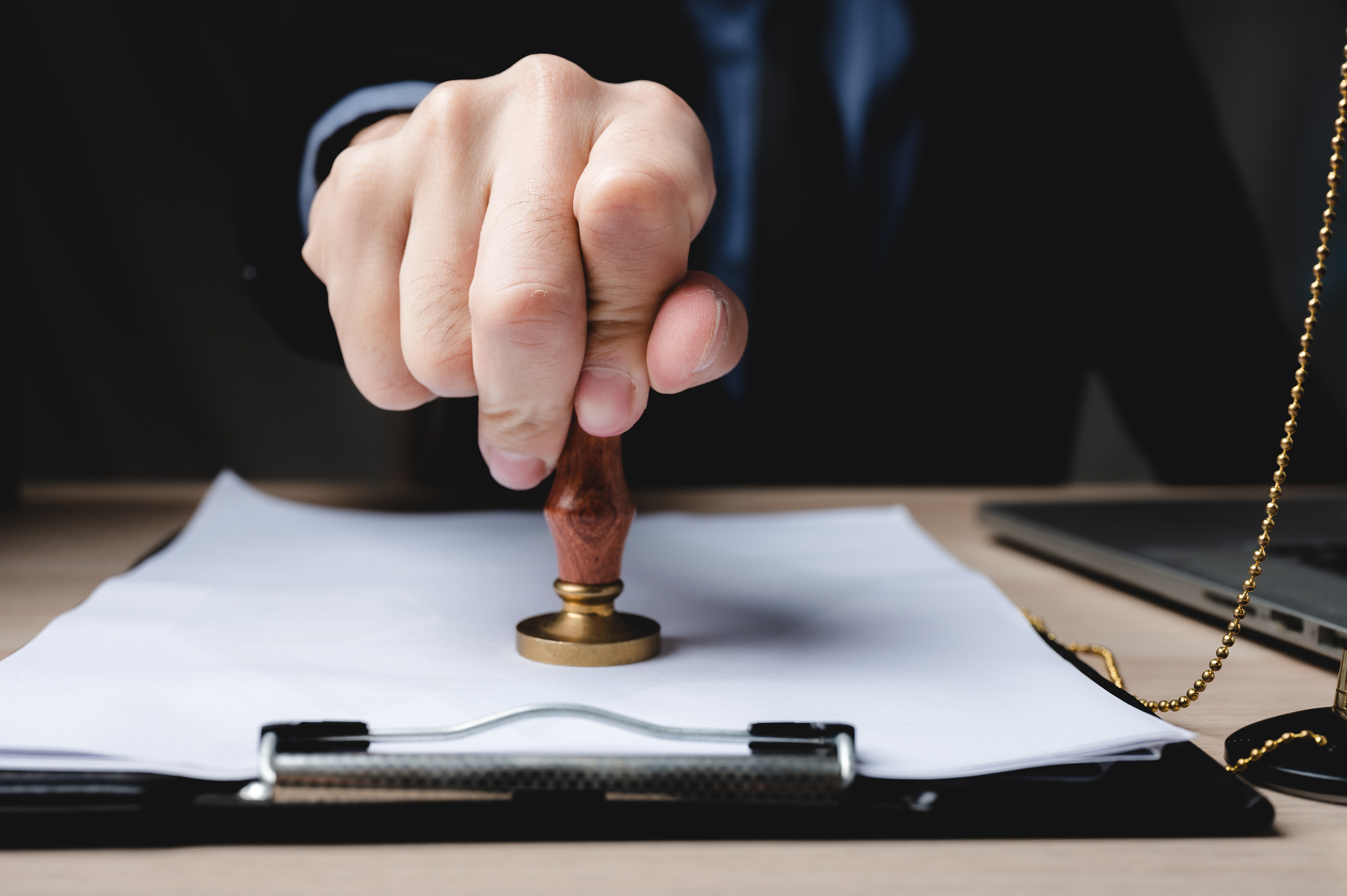 businessman signing contract paperwork