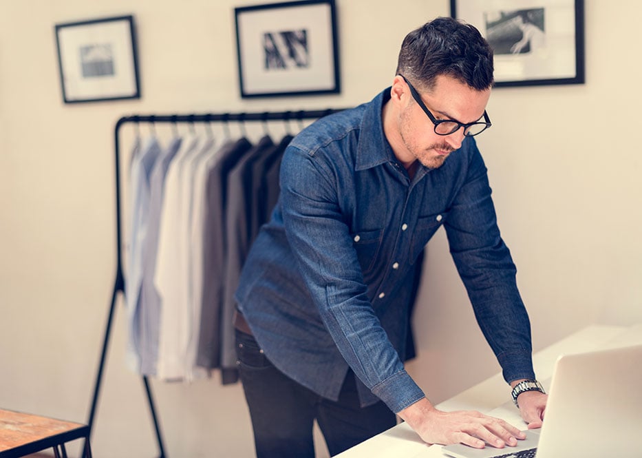 retail_intro-(Man-working-in-retail-cloth-shop)