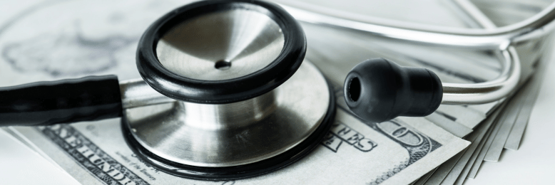Stethoscope on money, signifying healthcare MSP financial management