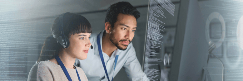 Tech support team monitoring co-managed IT systems in a call center