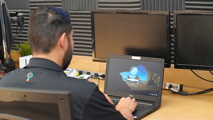 Technician-Back-looking-at-a-computer