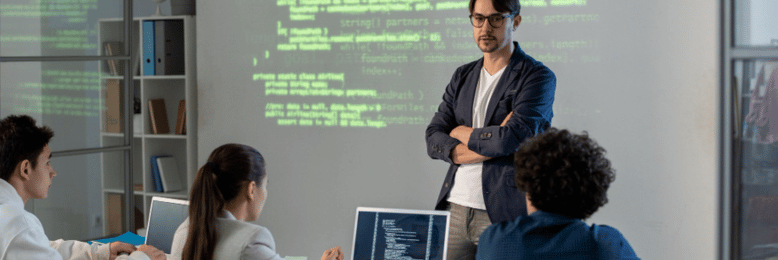 a person providing a training on other employees