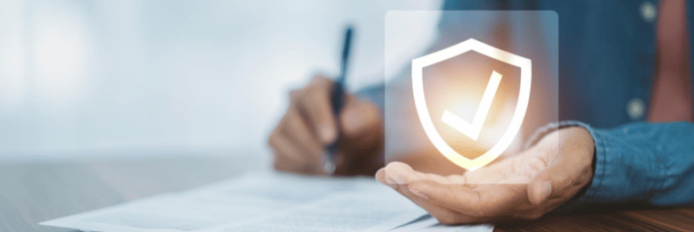 a person signing a paper regarding cybersecurity