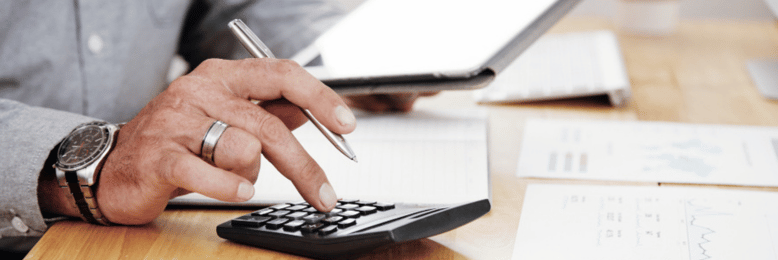 a person using a calculator while using computation