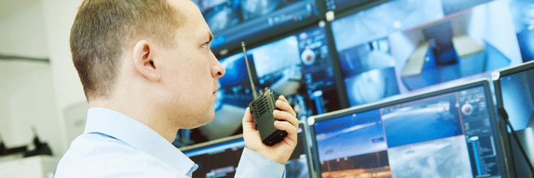 a security personnel checking security footage