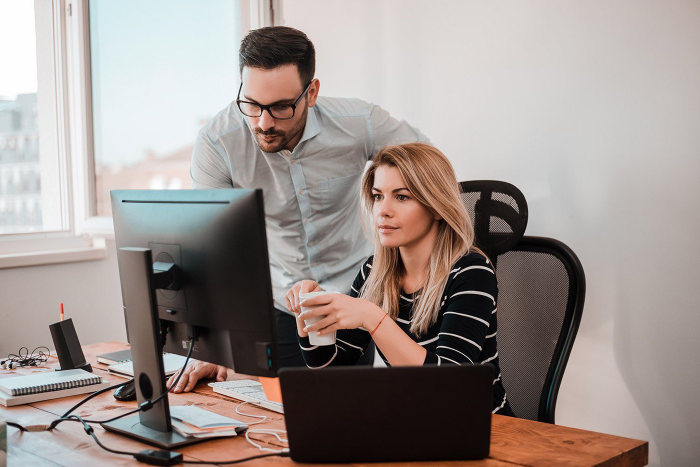 business-people-at-desk-in-office