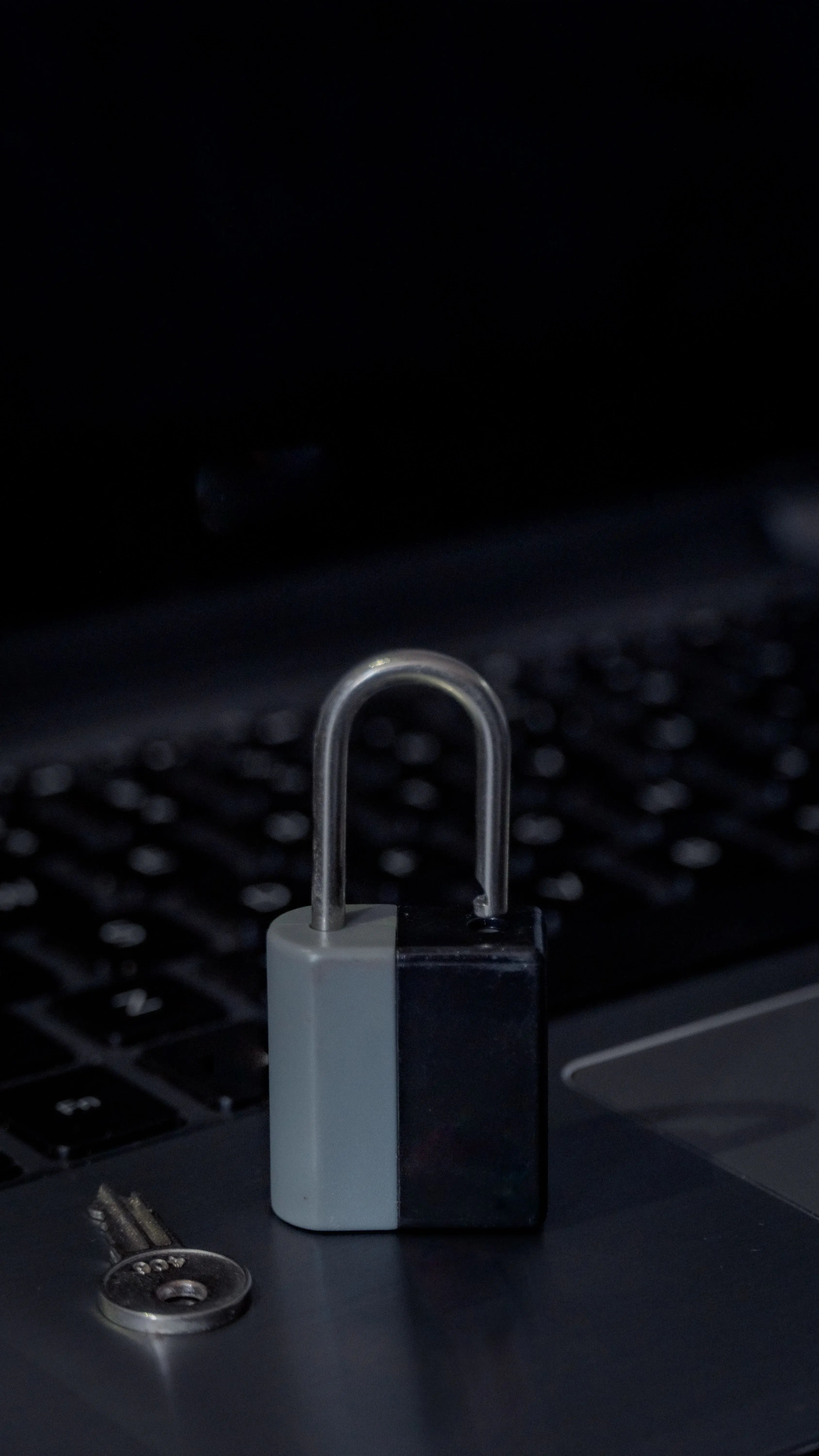 closeup-shot-of-silver-and-black-lock-and-key-on-l-2025-02-08-23-01-02-utc