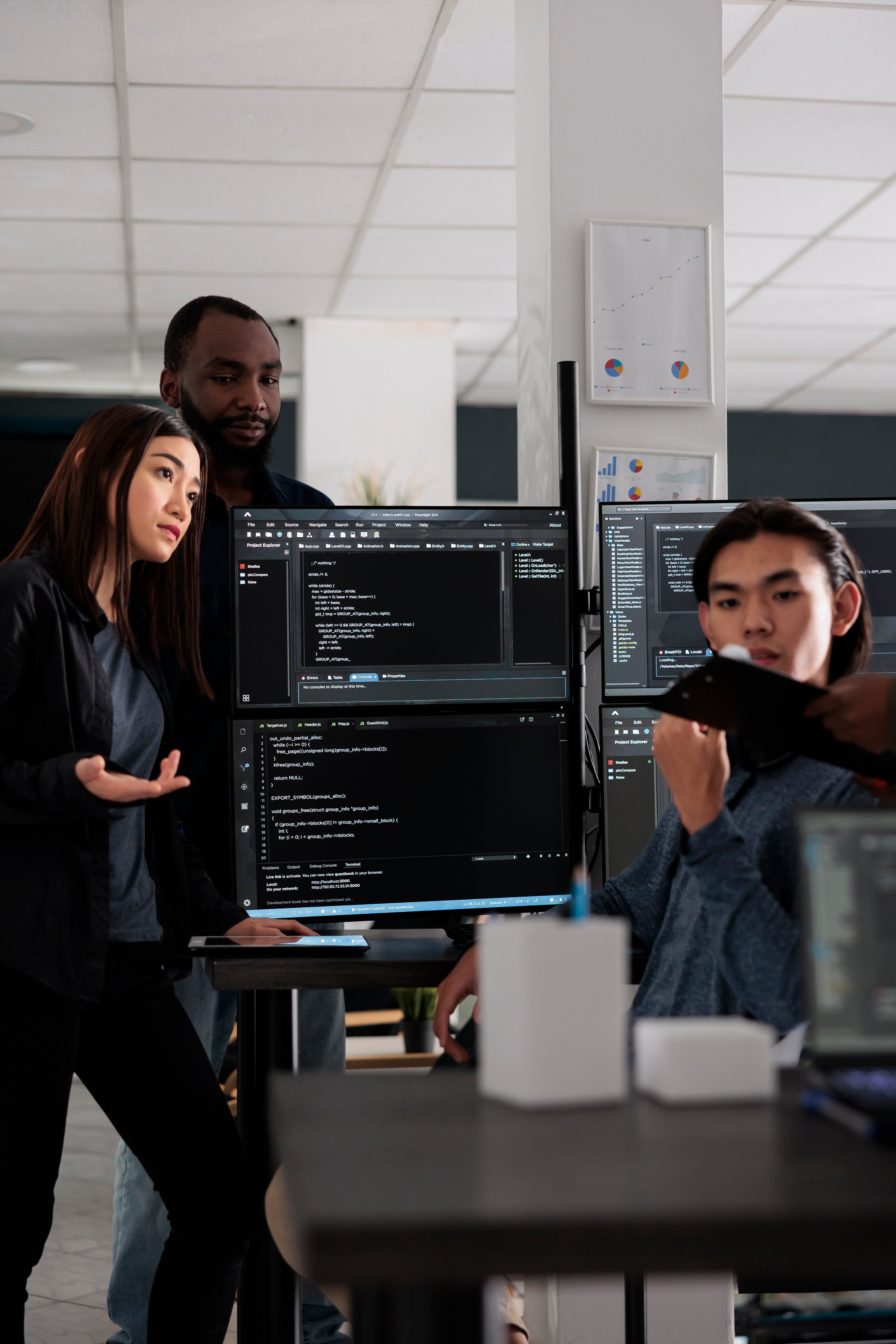 diverse-database-developers-discussing-about-html-2025-02-17-08-26-24-utc