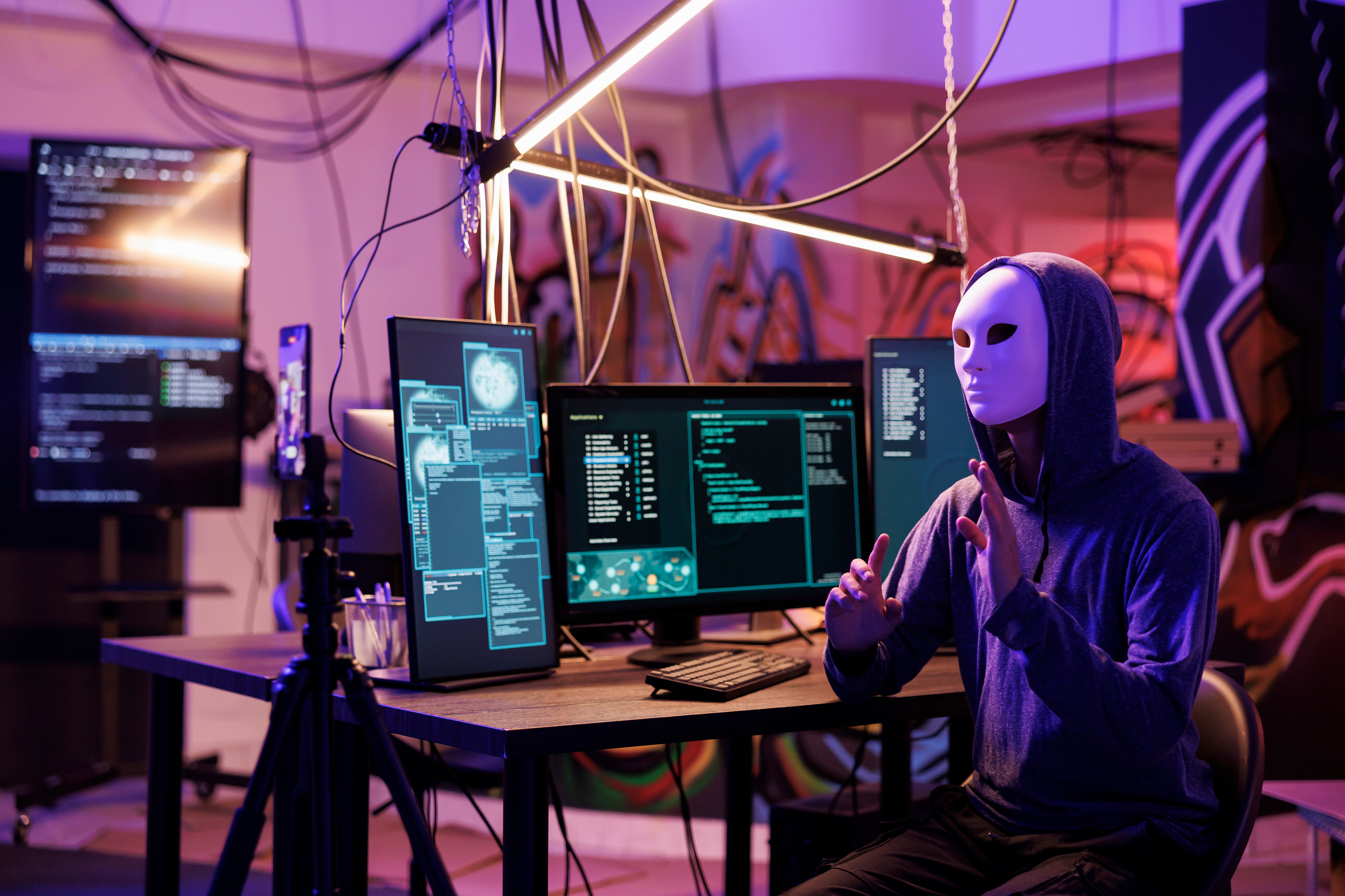 hacker-in-anonymous-mask-recording-video-2025-02-18-20-59-05-utc