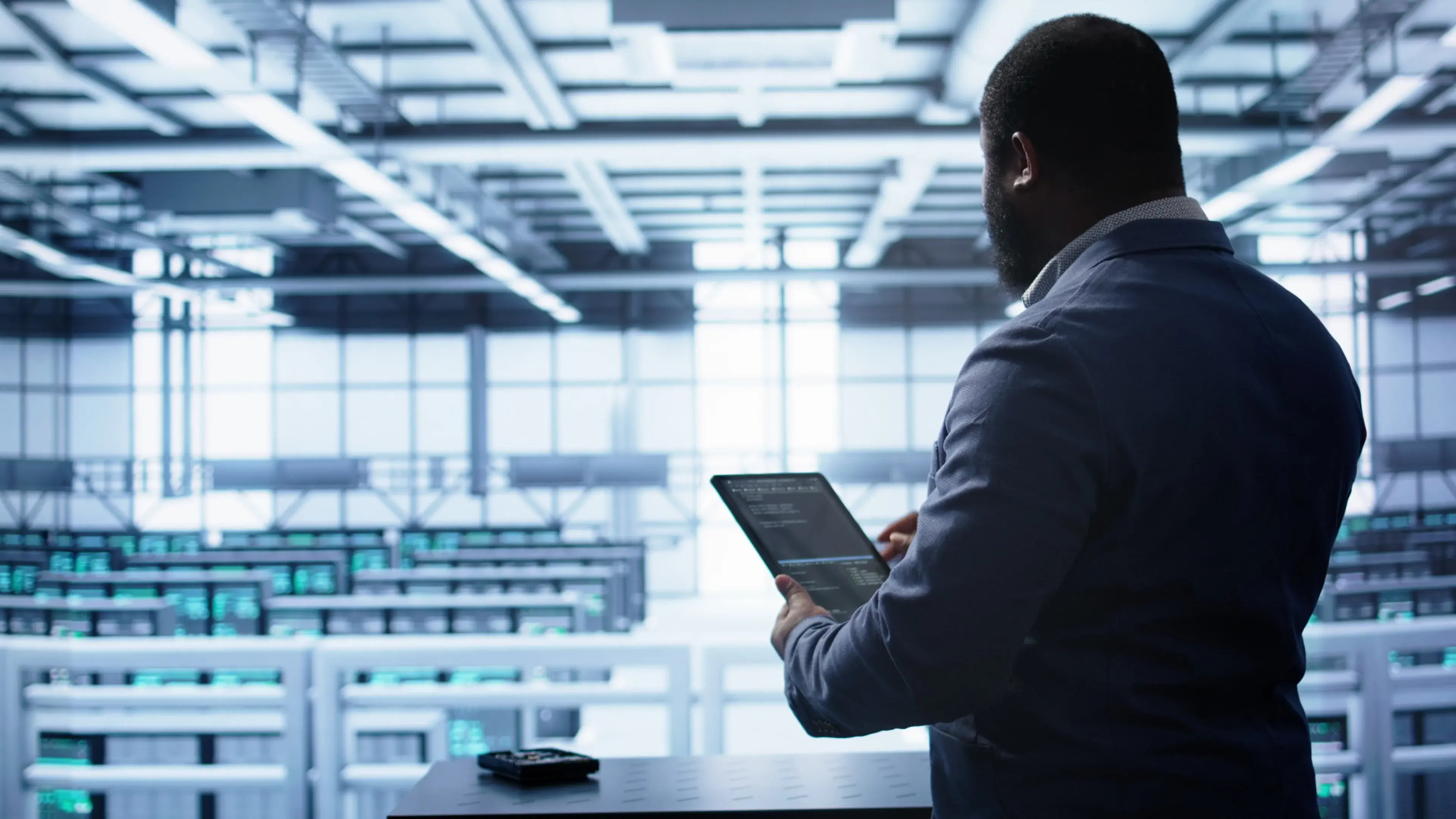 it-expert-in-data-center-holding-tablet-replacing-2025-02-19-23-57-10-utc