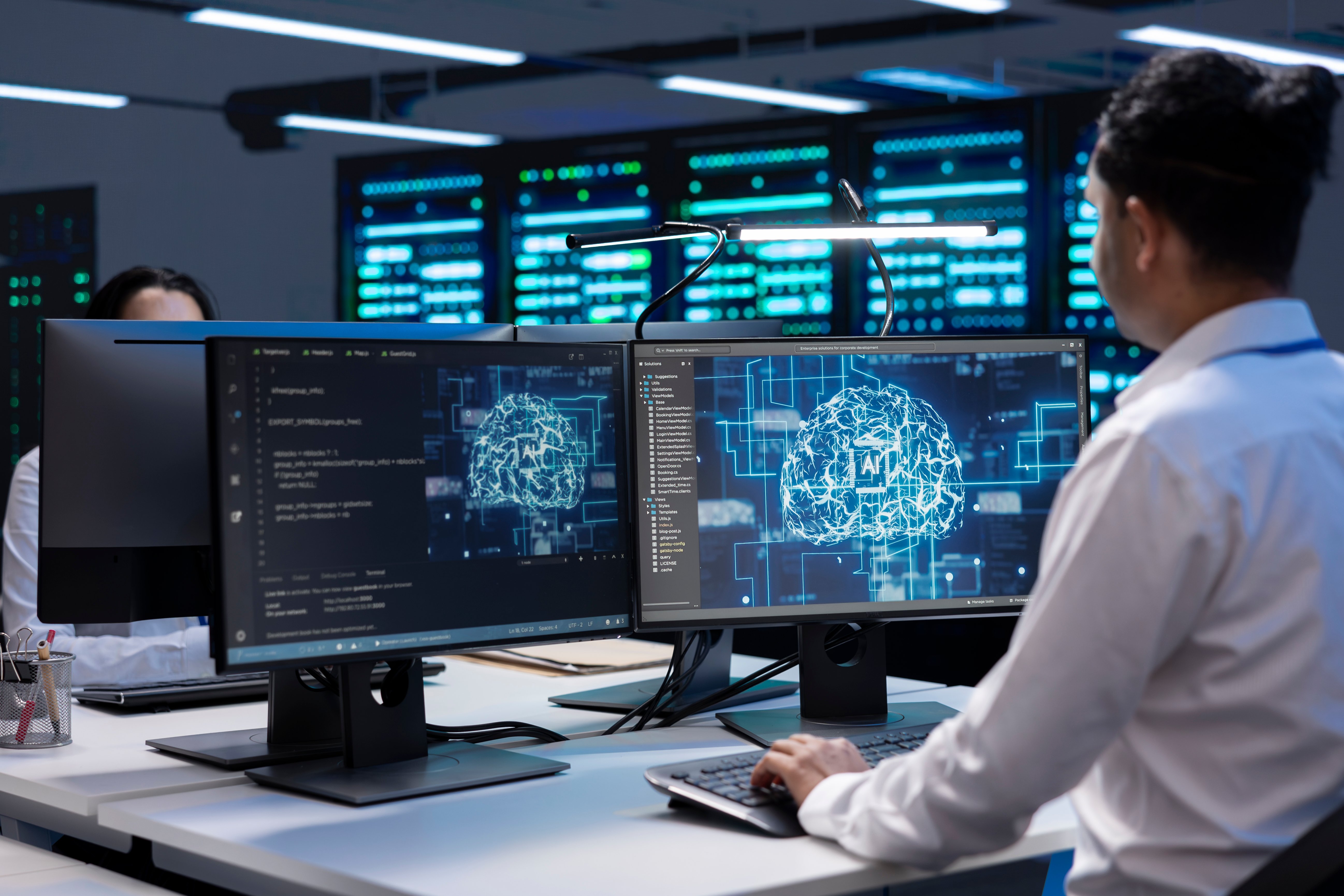 man-in-server-farm-storing-data-used-for-machine-l-2025-02-20-02-55-25-utc