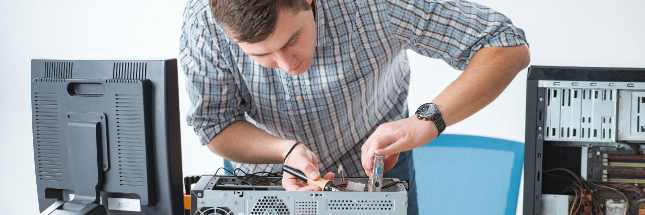 Computer technician assembling a workstation