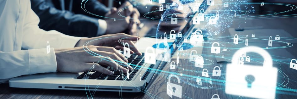 person on laptop checking their cyber insurance policy