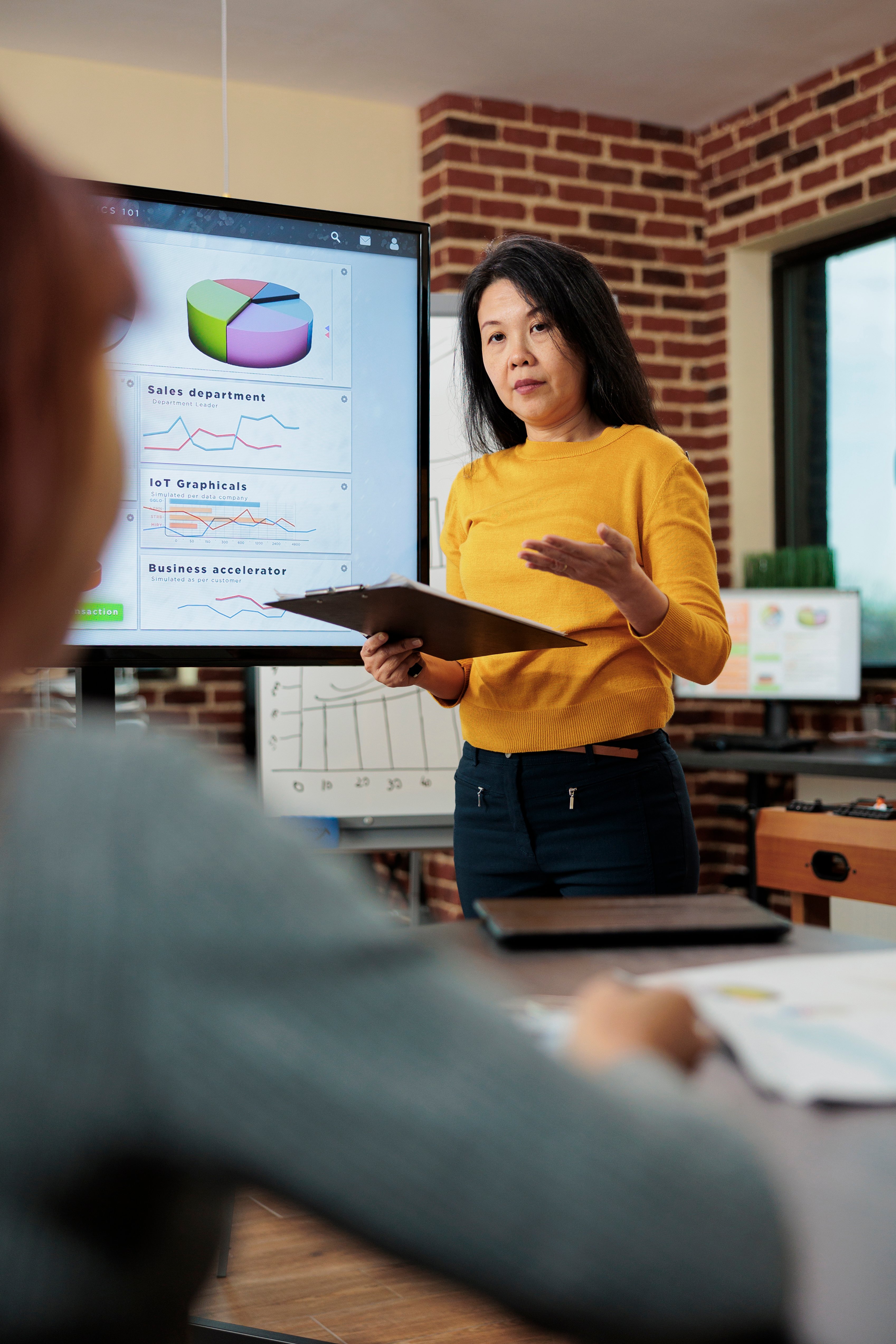 portrait-of-executive-manager-holding-clipboard-2026-03-18-21-53-26-utc