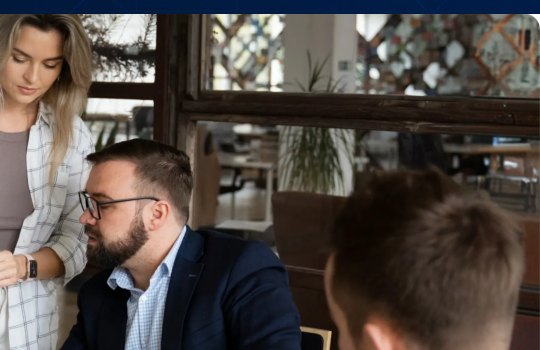 An ITS Solutions Consultant reviewing a client's IT plan together