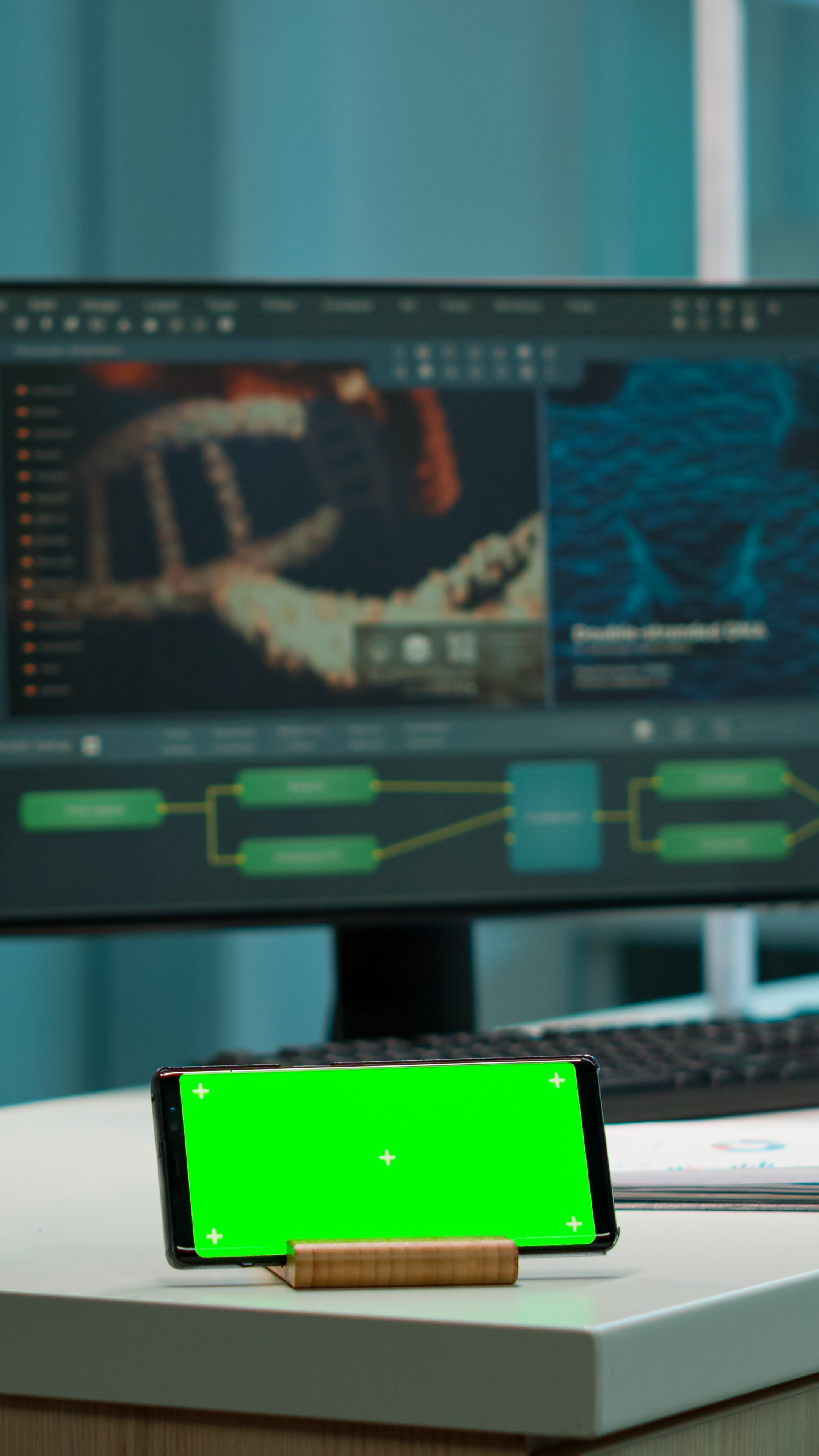 scientist-using-smartphone-with-green-screen-place-2025-02-18-23-39-26-utc