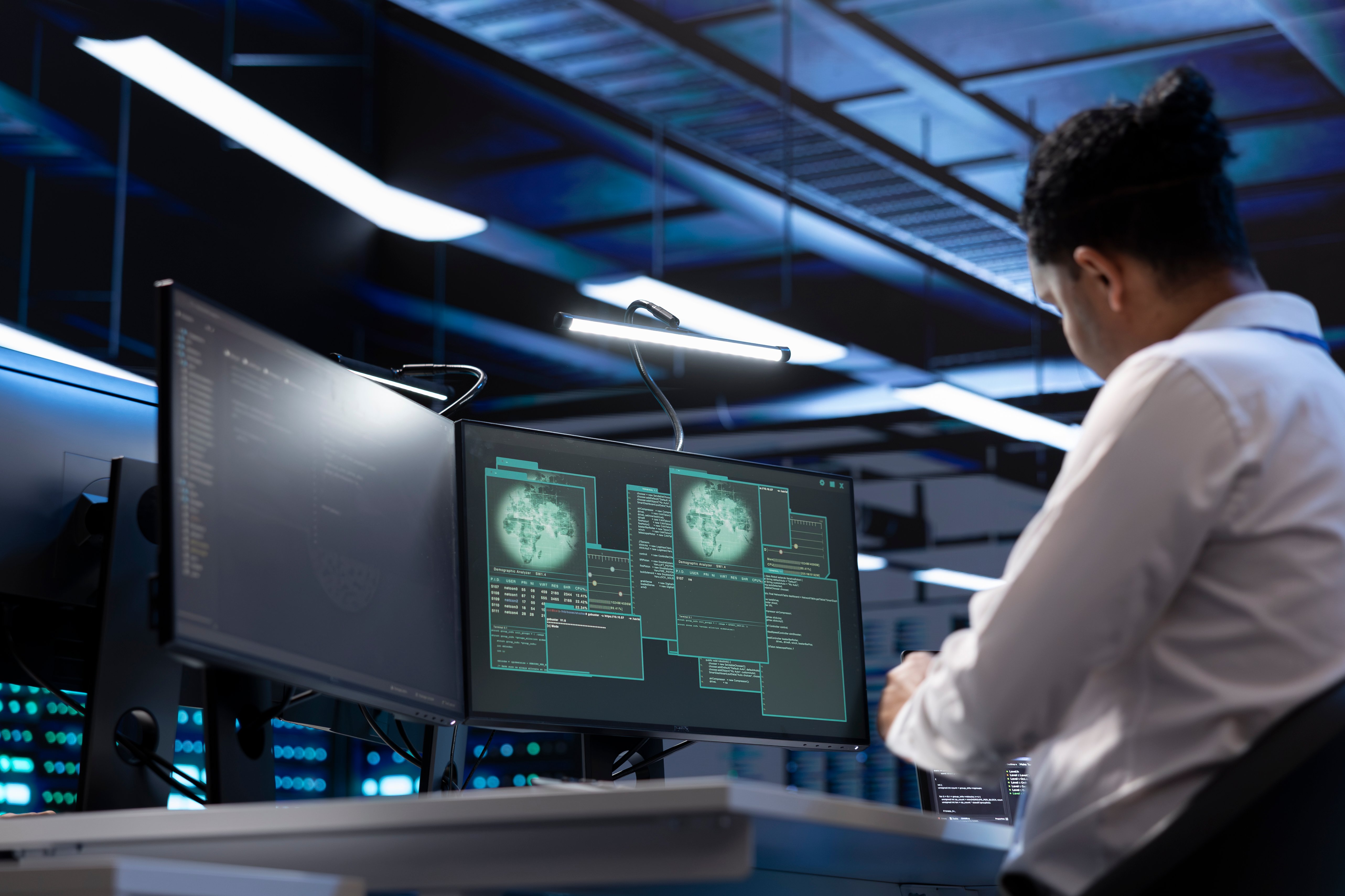 software-developer-using-computer-in-server-room-t-2025-02-19-23-49-52-utc