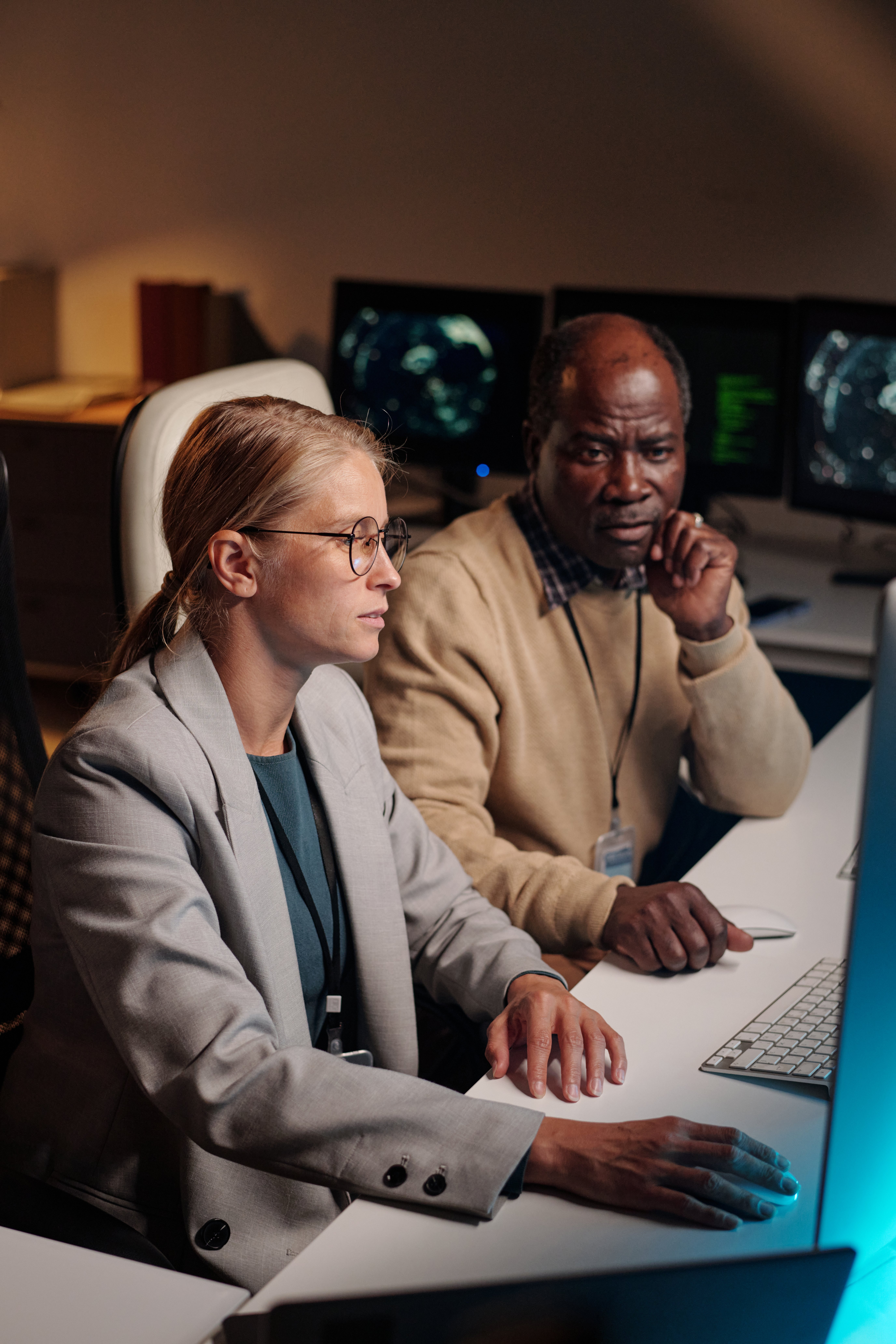 two-coworkers-discussing-coded-data-2025-03-17-13-13-34-utc